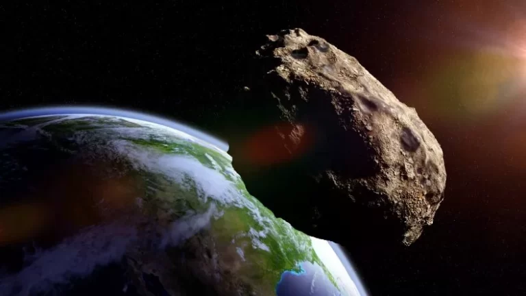 A stock illustration of an asteroid as it passes Earth. Several asteroids will pay a flying visit to our planet over the Fall equinox period, including one three times the size of the Statue of liberty. DOTTEDHIPPO/GETTY